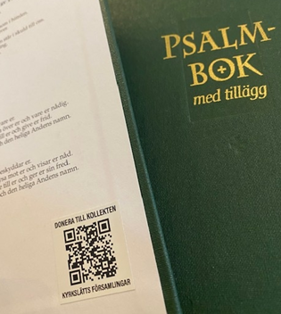 Bild på psalmboken som visar var QR-kooden finns
